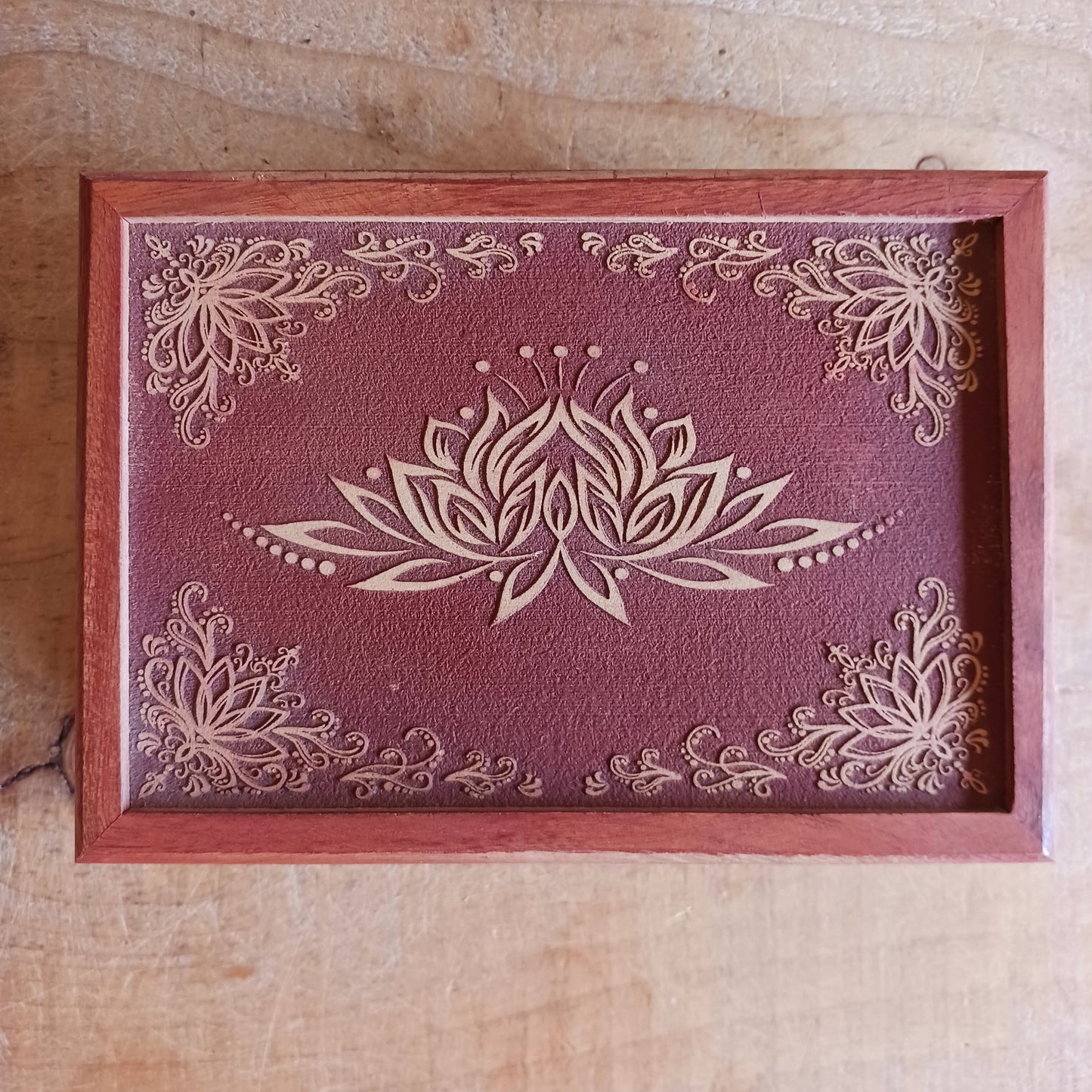 Celebrate the elegance of hand-carved craftsmanship with this Wooden Lotus Keepsake Box, made from sustainably sourced mango wood in India. The intricate Lotus design embodies spiritual harmony, making it perfect for storing jewellery, trinkets, or cherished keepsakes.