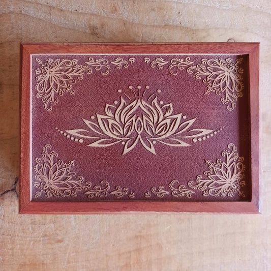 Celebrate the elegance of hand-carved craftsmanship with this Wooden Lotus Keepsake Box, made from sustainably sourced mango wood in India. The intricate Lotus design embodies spiritual harmony, making it perfect for storing jewellery, trinkets, or cherished keepsakes.