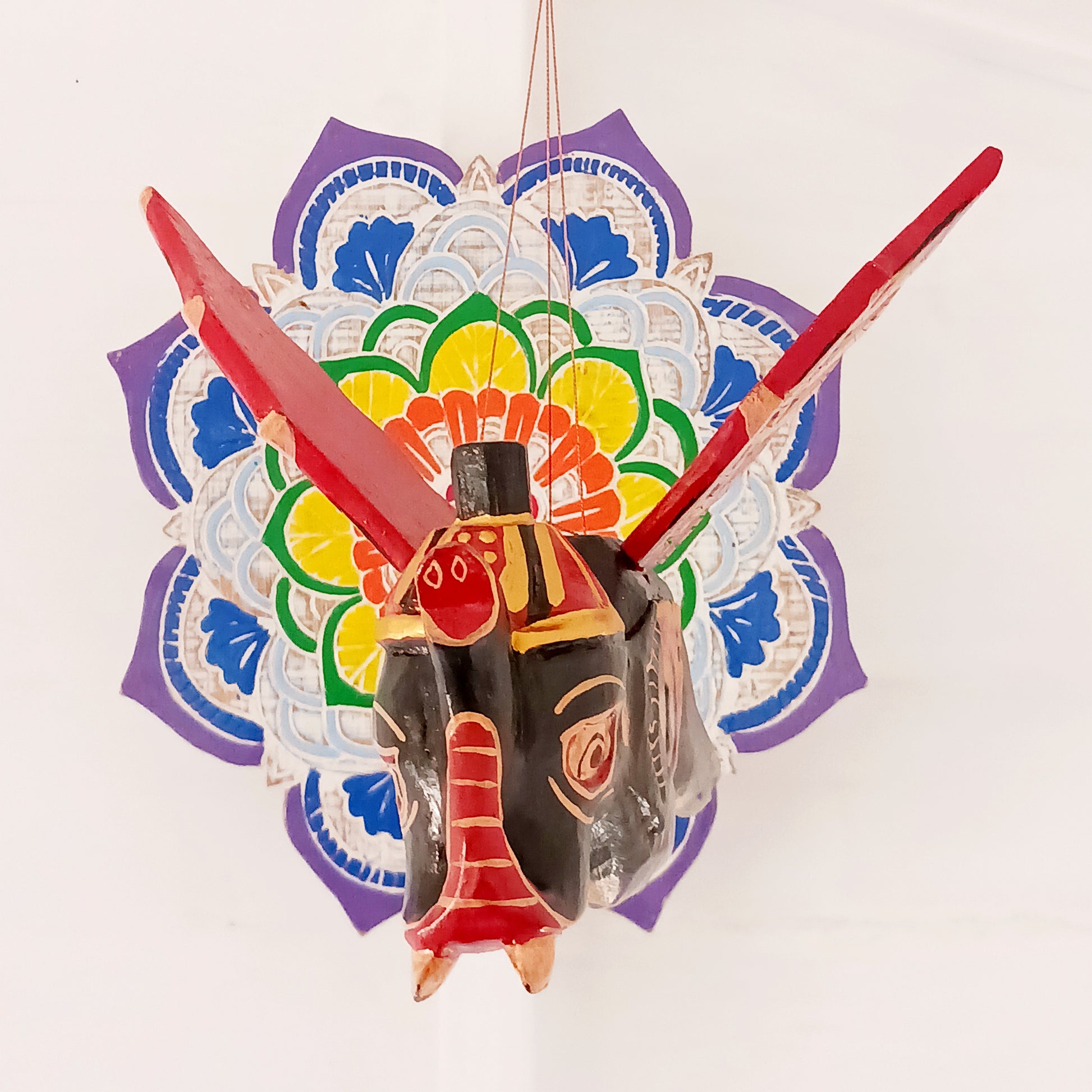 Bring a touch of wonder to your space with this enchanting Flying Elephant Mobile. Each piece is hand-carved from lightweight wood and finished with unique hand-painted patterns, giving every elephant its own personality. Delicately balanced wings hover gracefully with the slightest breeze, creating a calming sense of motion and magic.