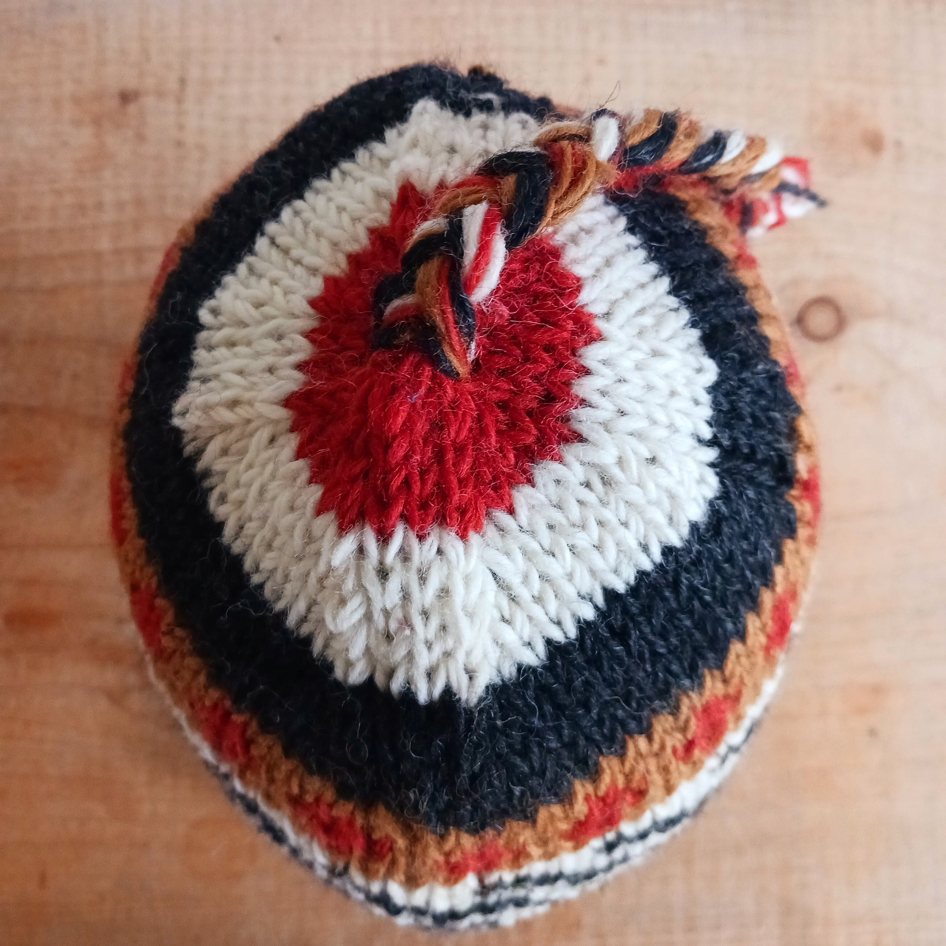 Stay cozy and stylish with our handmade chunky wool earflap hats, crafted in Nepal by skilled women artisans in Kathmandu. Each hat is 100% pure wool and features a soft polar fleece lining for extra warmth and comfort. Perfect for cold winter days, outdoor adventures, or adding a touch of handmade charm to your look.