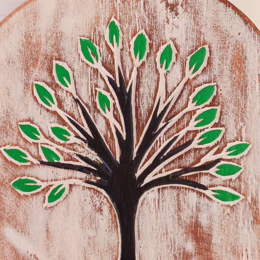 Bring meaningful symbolism and artisan beauty into your space with this chunky hand-carved wood plaque from Bali, Indonesia. Carefully crafted and painted by skilled artisans, this decorative piece features intricate etchings of the Tree of Life, a universal symbol found in many cultures and spiritual traditions.