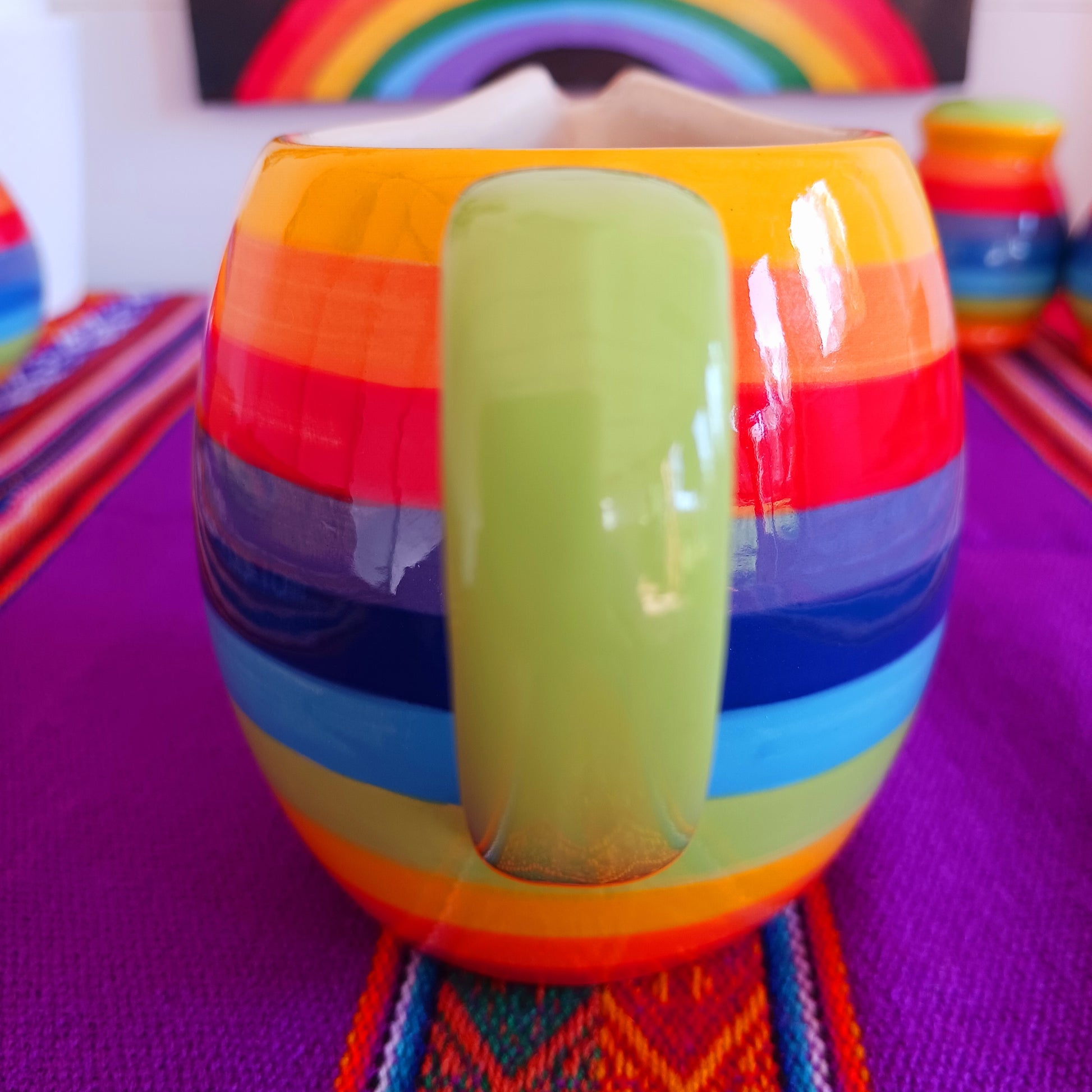 This rainbow stripe ceramic milk jug will brighten up any home. The vibrant stripes are hand painted giving each piece individual character.