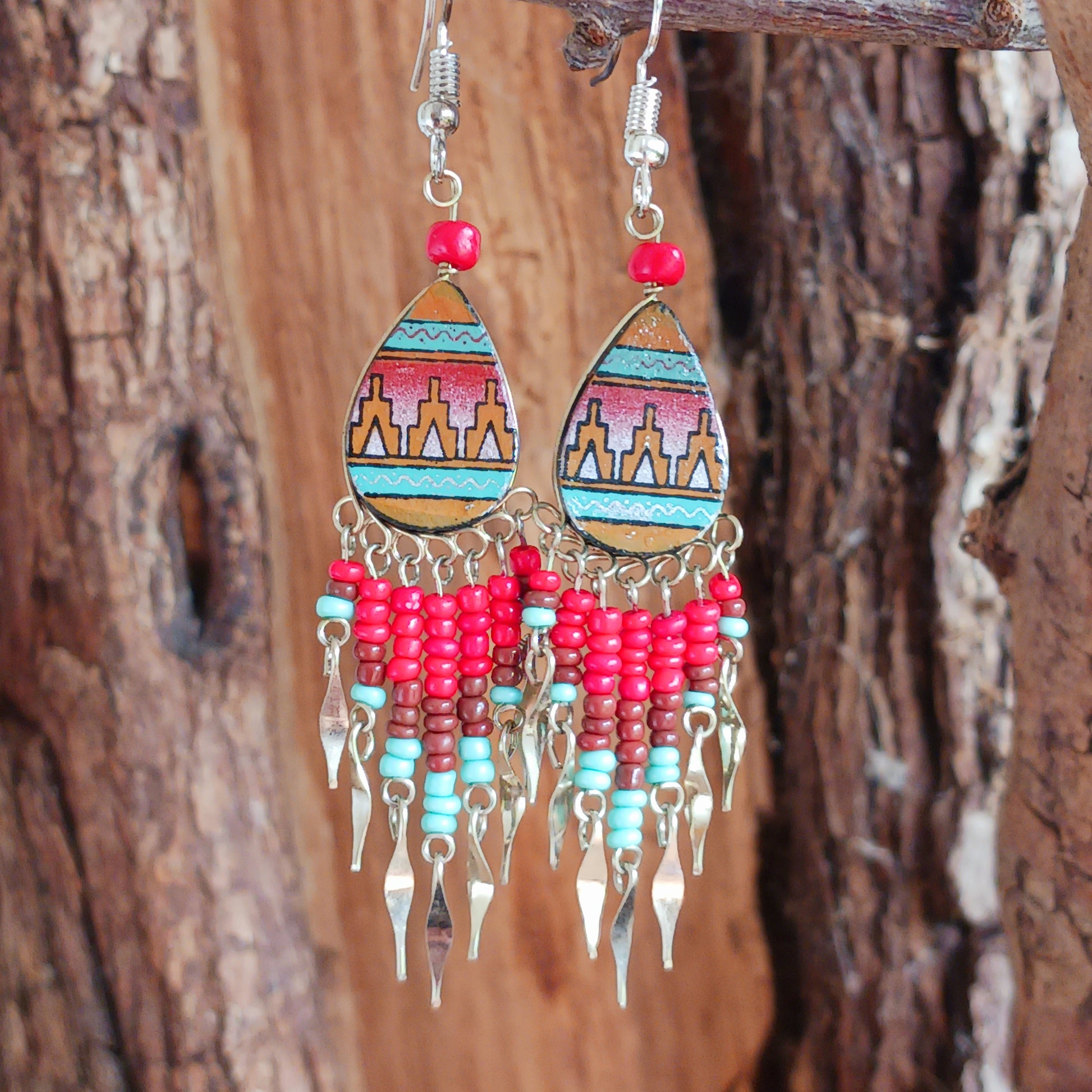 Handmade Incan teardrop earrings with traditional patterns & silver hooks. Ethically made in Peru. Unique, vibrant & perfect for Boho or gift giving.