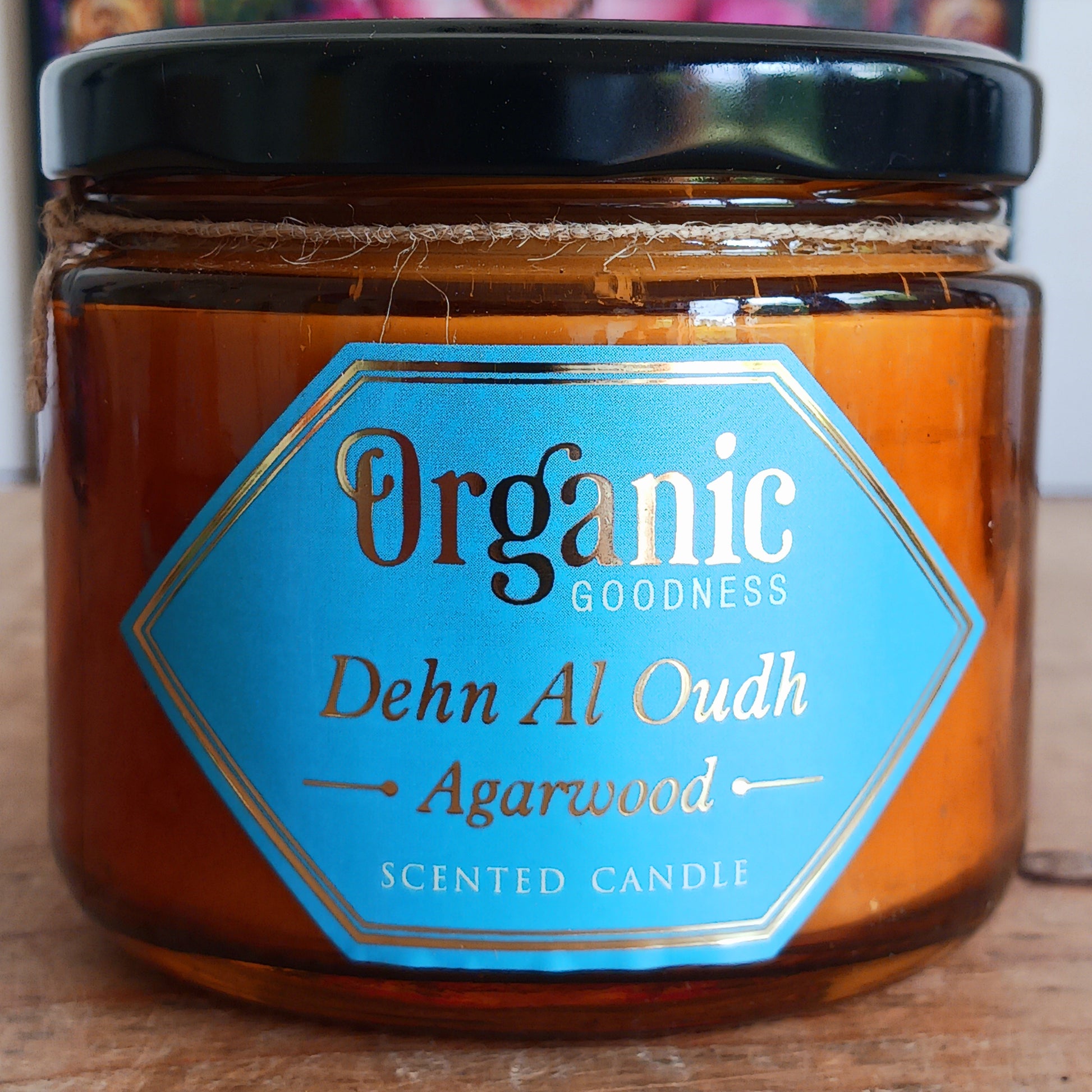 Organic Goodness candle scented with Agarwood and Oud essential oils creating a warm and inviting woody scent.