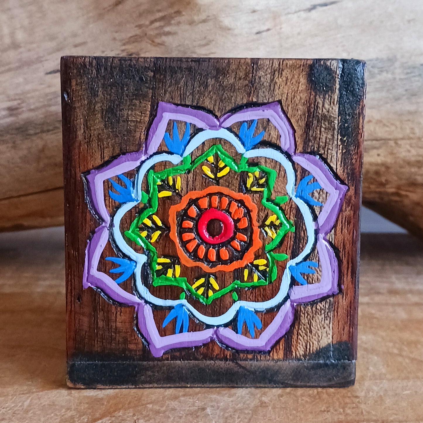 Add a burst of colour and joy to your space with this Hand Painted Mandala Wooden Pots Set, handmade in Indonesia and Fairtrade certified. Each pot is carefully painted by skilled artisans, making every set unique and full of character.