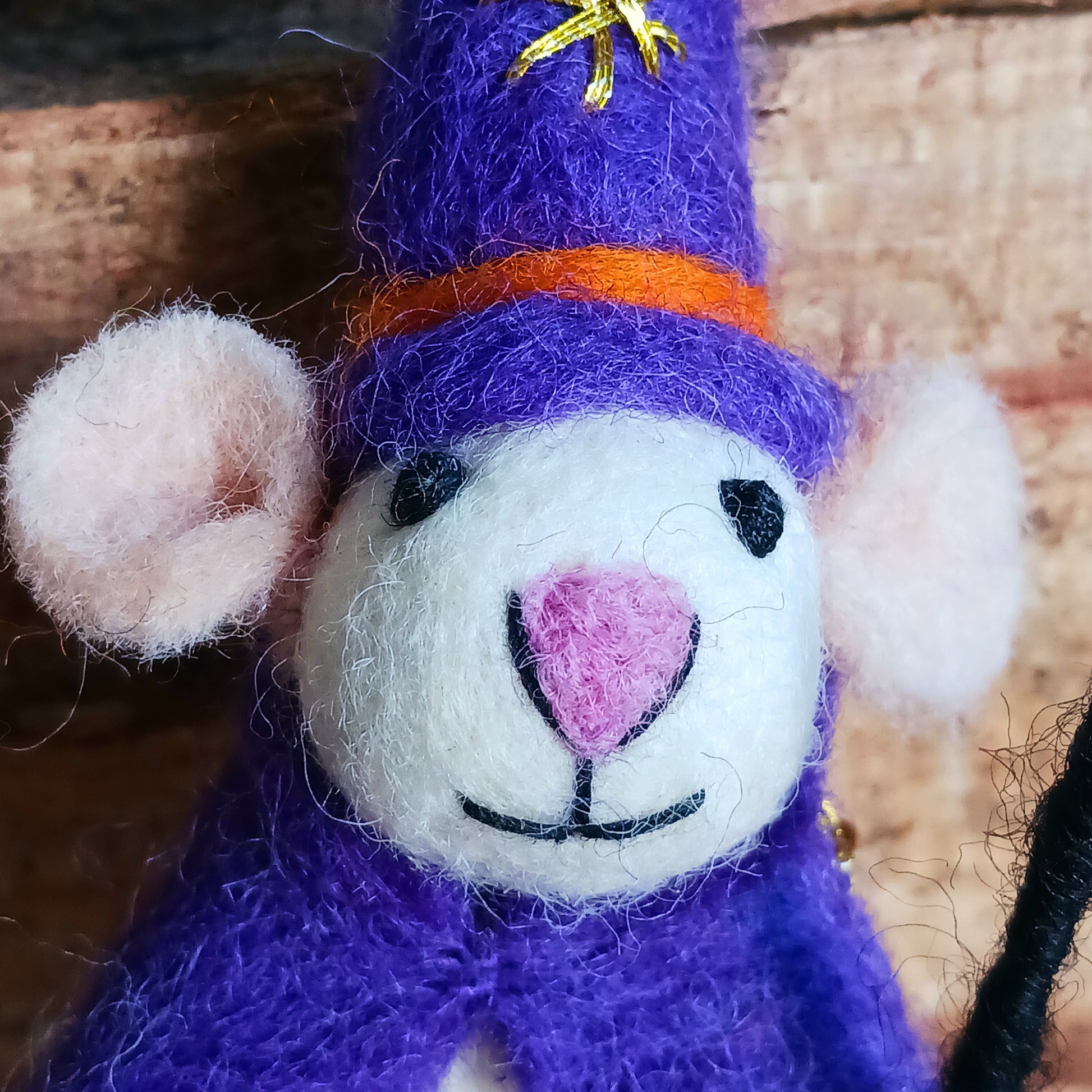 Bring a touch of handcrafted Halloween charm to your home with these delightful felted mice dressed as a Wizard character. Each mouse features adorable details including long tails, soft pink ears and noses, and colourful pointed hats and capes. The Wizard style is elegantly finished with gold star embroidery for extra magical flair.