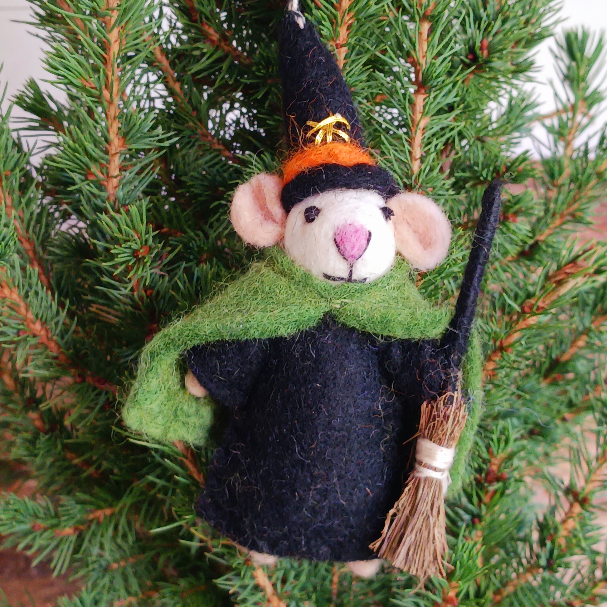 Bring a touch of handcrafted Halloween charm to your home with these delightful felted mice dressed as a Witch character. Each mouse features adorable details including long tails, soft pink ears and noses, and colourful pointed hats and capes. The Witch style is elegantly finished with gold star embroidery for extra magical flair, complete with little broomstick.
