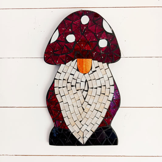 Bring personality and charm to your home with this Handcrafted Red Mosaic Gnome Wall Plaque. Featuring a delightful gnome design created with vibrant red mosaic tiles, this unique wall decoration adds a playful touch to any living space.