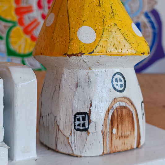 Bring a sprinkle of magic to your everyday routine with the Mushroom House Wooden Calendar. Crafted from lightweight, durable wood, this enchanting piece combines functionality with fairy-tale charm. Each day, simply rotate the wooden blocks to keep track of the date—no need for replacements, making it a timeless addition to your home or office.
