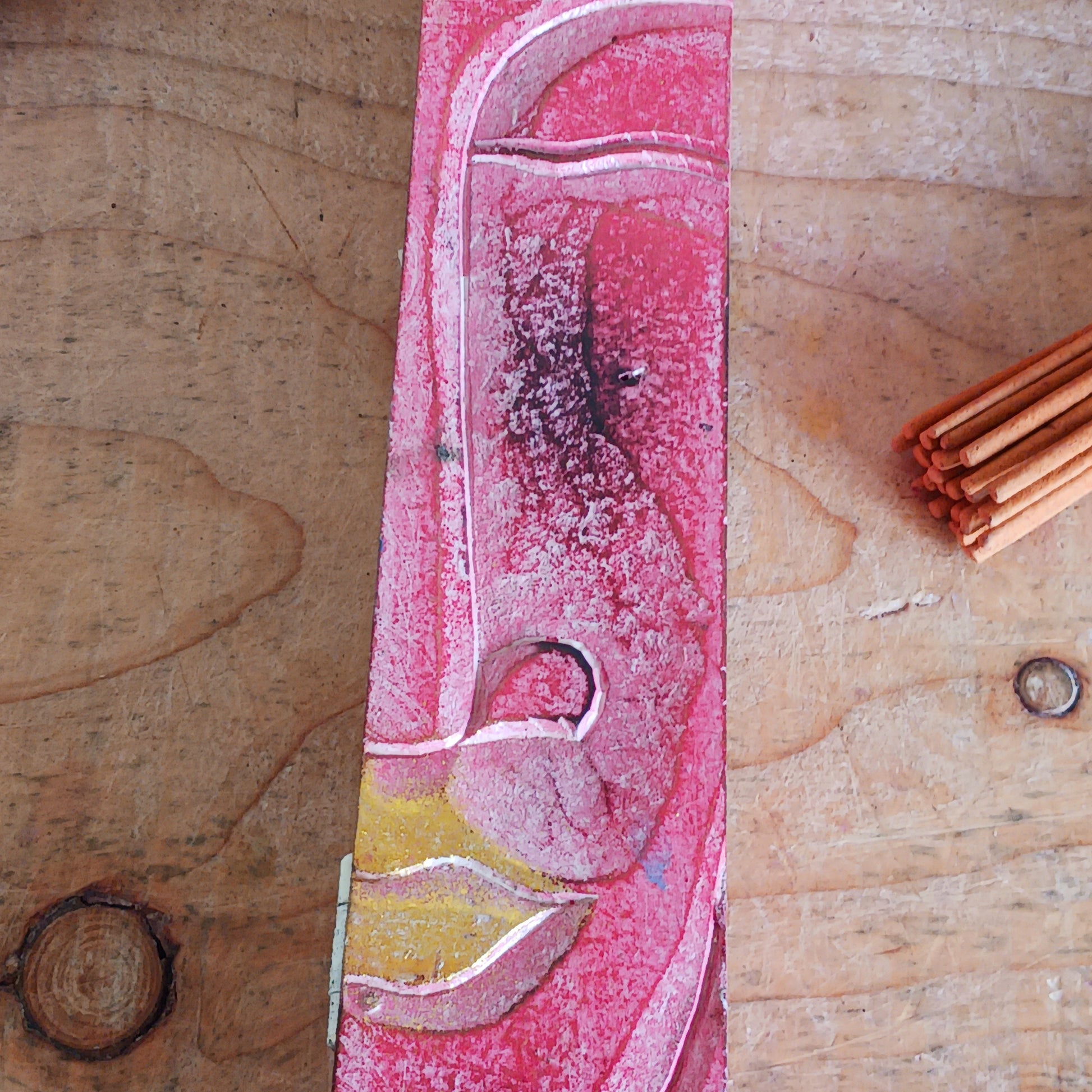 This unique incense stick holder is perfect to catch the ash from your favourite incense. It has been handmade from responsibly sourced wood and beautifully decorated with a handcarved Buddha head.