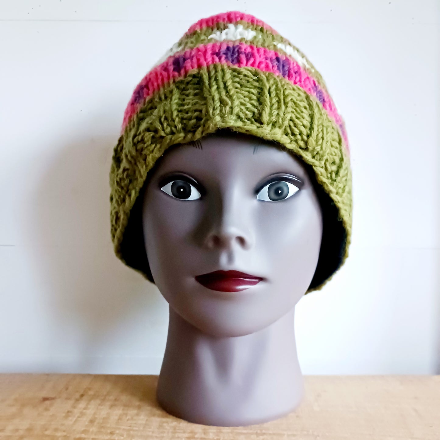 Stay warm in authentic Himalayan style with our Handmade Chunky Wool Beanie Hats, lovingly hand-knitted in Nepal by skilled Kathmandu women artisans. Crafted from 100% natural wool and lined with soft polar fleece, these beanies provide exceptional warmth, comfort, and durability — perfect for cold weather adventures or everyday winter wear.