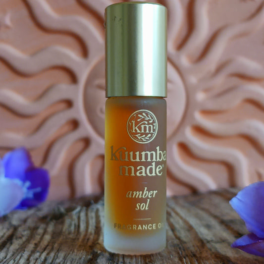 Wrap yourself in the warm, comforting glow of Kuumba Made Amber Sol Fragrance Oil. This highly concentrated, all-natural fragrance blends rich amber and fresh pine with a touch of golden caramel, creating a sensual, cozy scent that lingers beautifully on the skin.