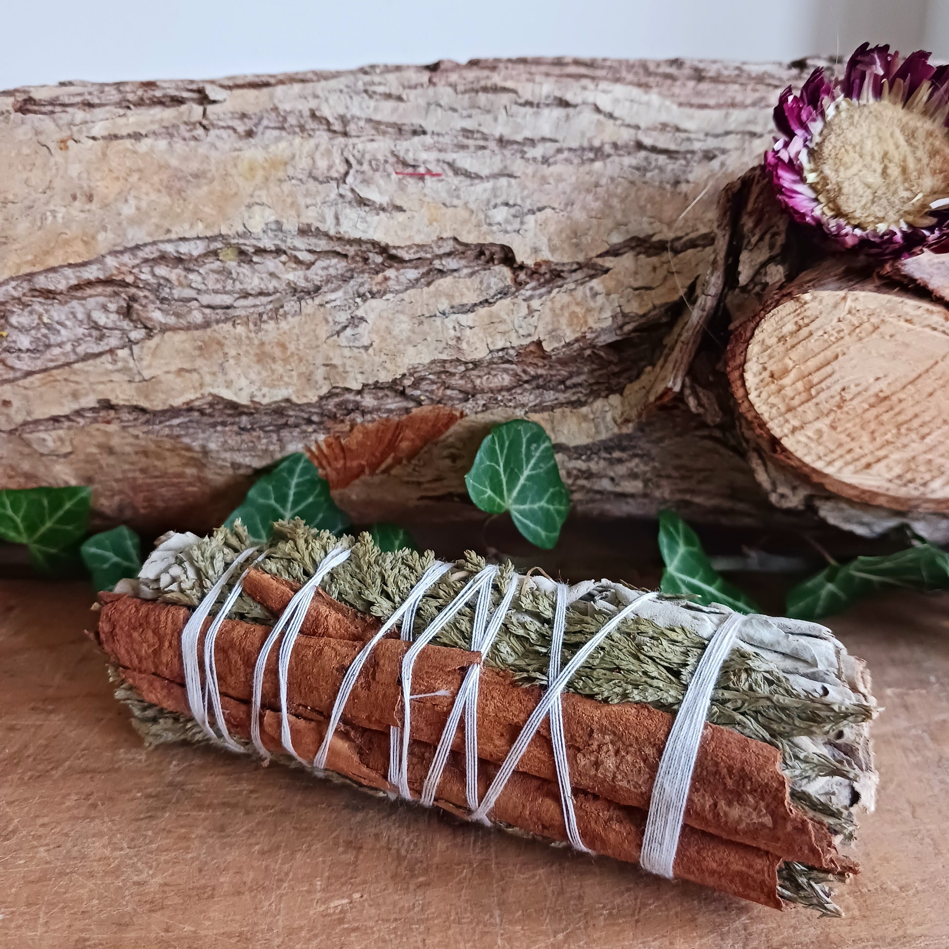 This smudge stick features a combination of three sacred herbs, White Sage, Cedar and Cinnamon.