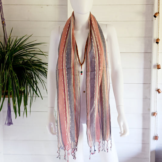 Immerse yourself in the alluring world of bohemian fashion with this delicate Indian Boho Scarf. Crafted with care, each scarf captures the essence of India's free-spirited charm, adding a touch of Boho elegance to your outfit. Whether draped effortlessly over your shoulders, wrapped as a headscarf, or styled with creative knots, this versatile accessory enhances your everyday fashion. Lightweight, breathable, and full of personality, it’s the perfect way to express your unique style.
