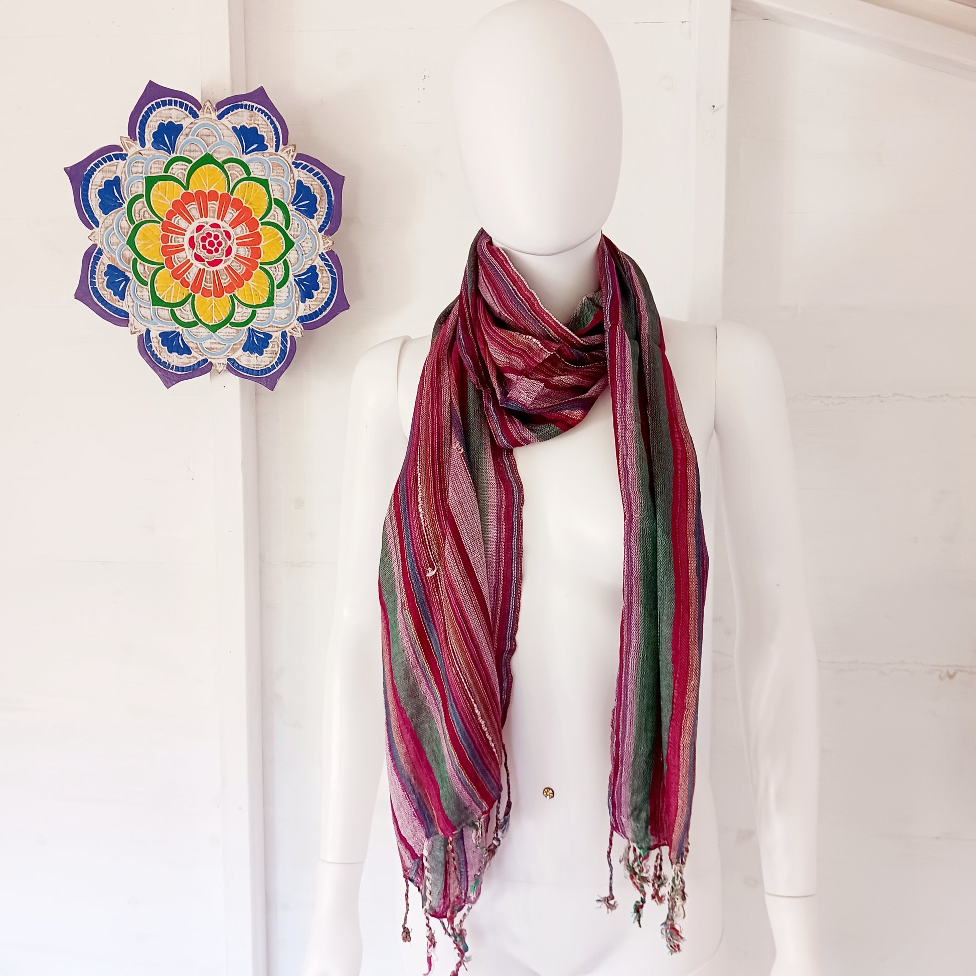 Immerse yourself in the alluring world of bohemian fashion with this delicate Indian Boho Scarf. Crafted with care, each scarf captures the essence of India's free-spirited charm, adding a touch of Boho elegance to your outfit.