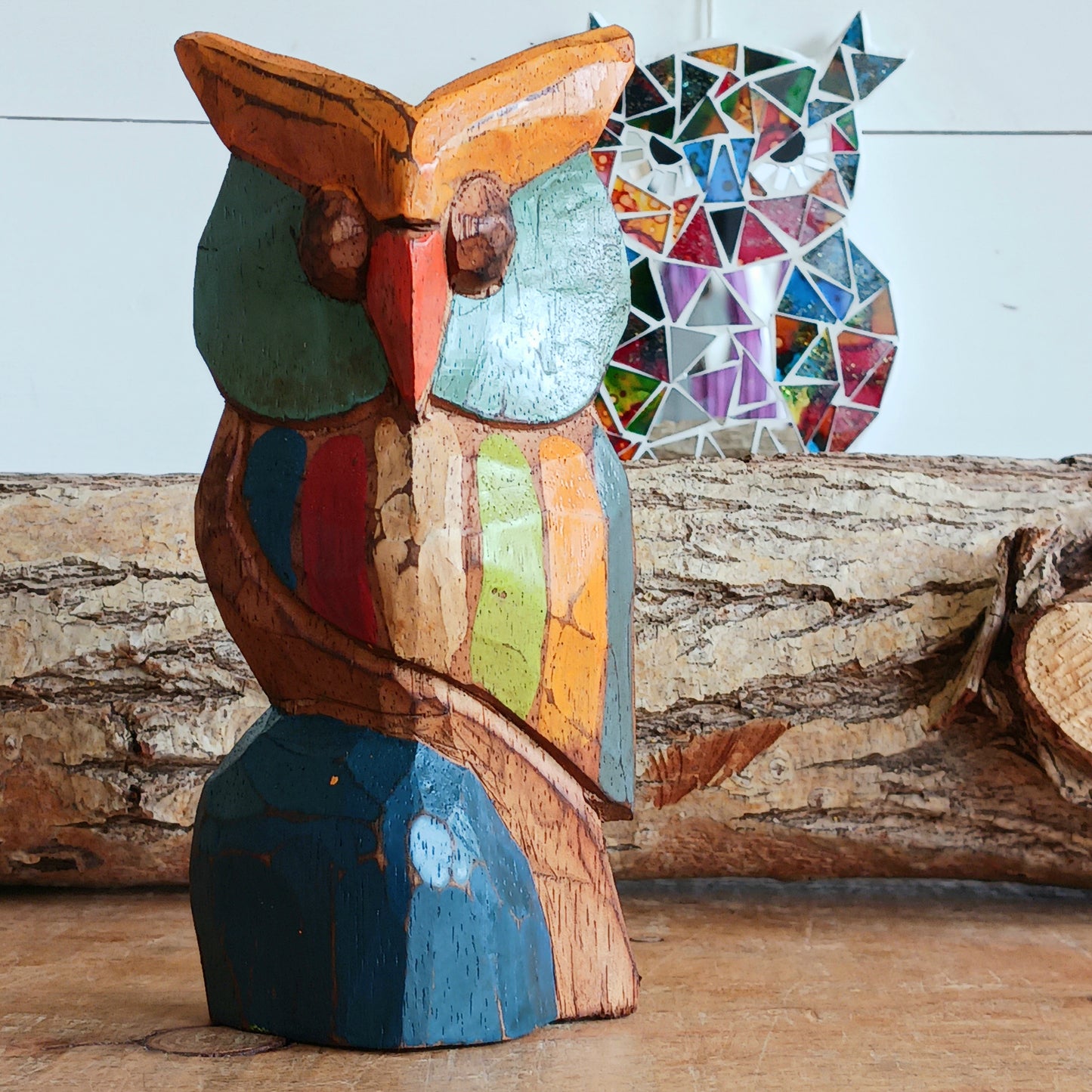 Bring a touch of nature and craftsmanship into your home with this beautifully hand-carved little wooden owl ornament. Carefully crafted from wood and finished in charming rustic colours, each owl is unique, showcasing the character and artistry of traditional woodcarving.