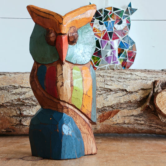Bring a touch of nature and craftsmanship into your home with this beautifully hand-carved little wooden owl ornament. Carefully crafted from wood and finished in charming rustic colours, each owl is unique, showcasing the character and artistry of traditional woodcarving.