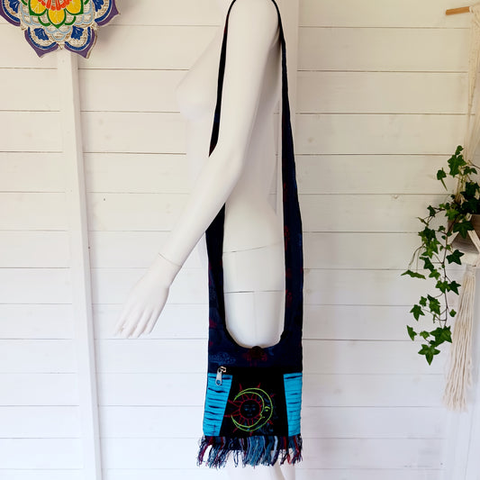 This lovely Sun & Moon shoulder bag is perfect for your next festival, travel trip or the beach. This cute handy passport bag is a great lightweight bag that can be worn as either a shoulder or crossbody bag.
