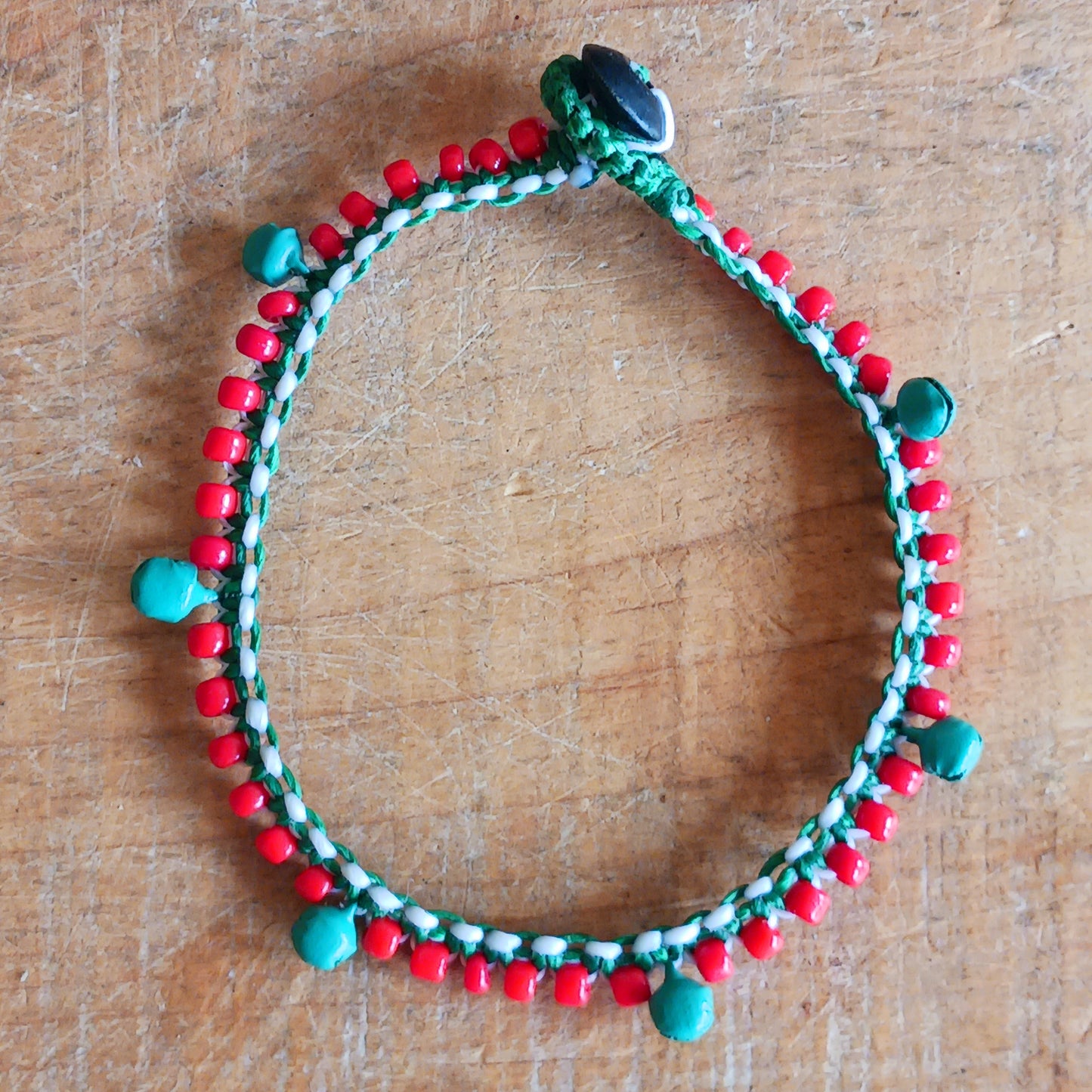 Add a playful touch to your look with these beautifully handmade Fairtrade jingle anklets from Thailand. Designed to bring both style and charm, each anklet features vibrant colours that instantly brighten any outfit.