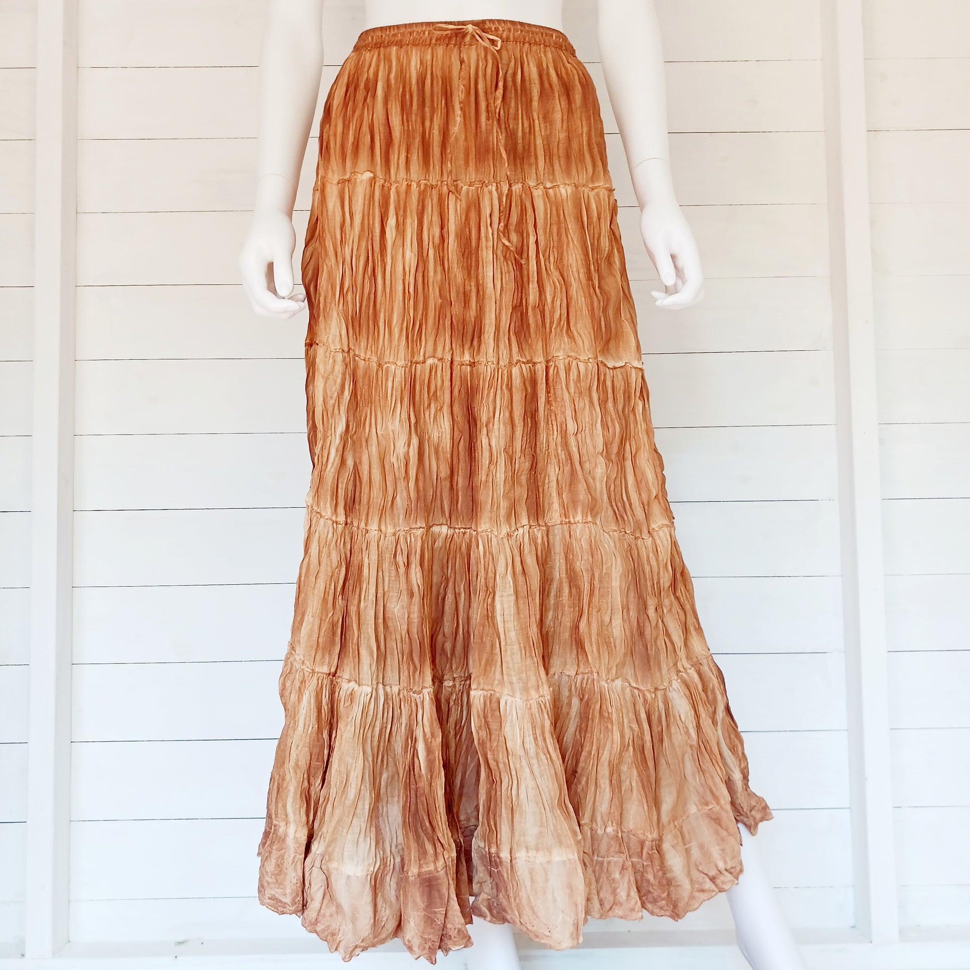 This beautiful Indian crinkle skirt is lovely and light so you can move with ease and comfort on a sunny day or a hot night. Made from rayon crepe, you can’t go wrong with this lovely skirt, it will add to your flowing summer style. And as rayon is quick drying, it also makes this a great beach cover up skirt.