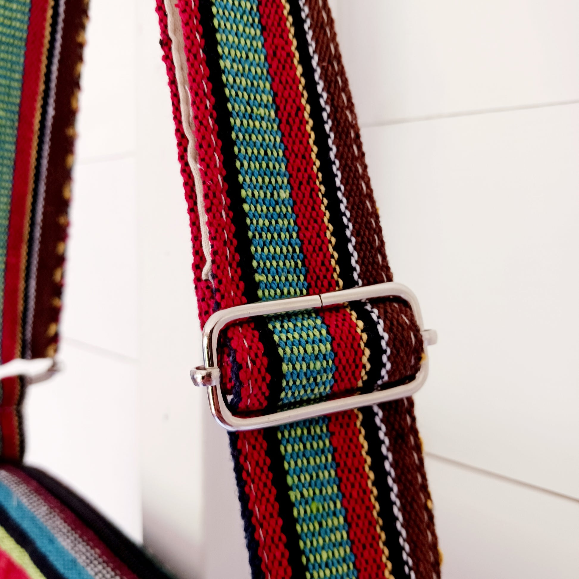 This is such a fantastic and handy messenger bag or satchel. Made from hemp with cotton lining, this bag is beautifully crafted featuring lots of handy compartments. On the front are three colourful and embroidered mushrooms.
