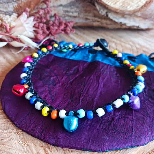 Add a playful touch to your look with these beautifully handmade Fairtrade jingle anklets from Thailand. Designed to bring both style and charm, each anklet features vibrant colours that instantly brighten any outfit.