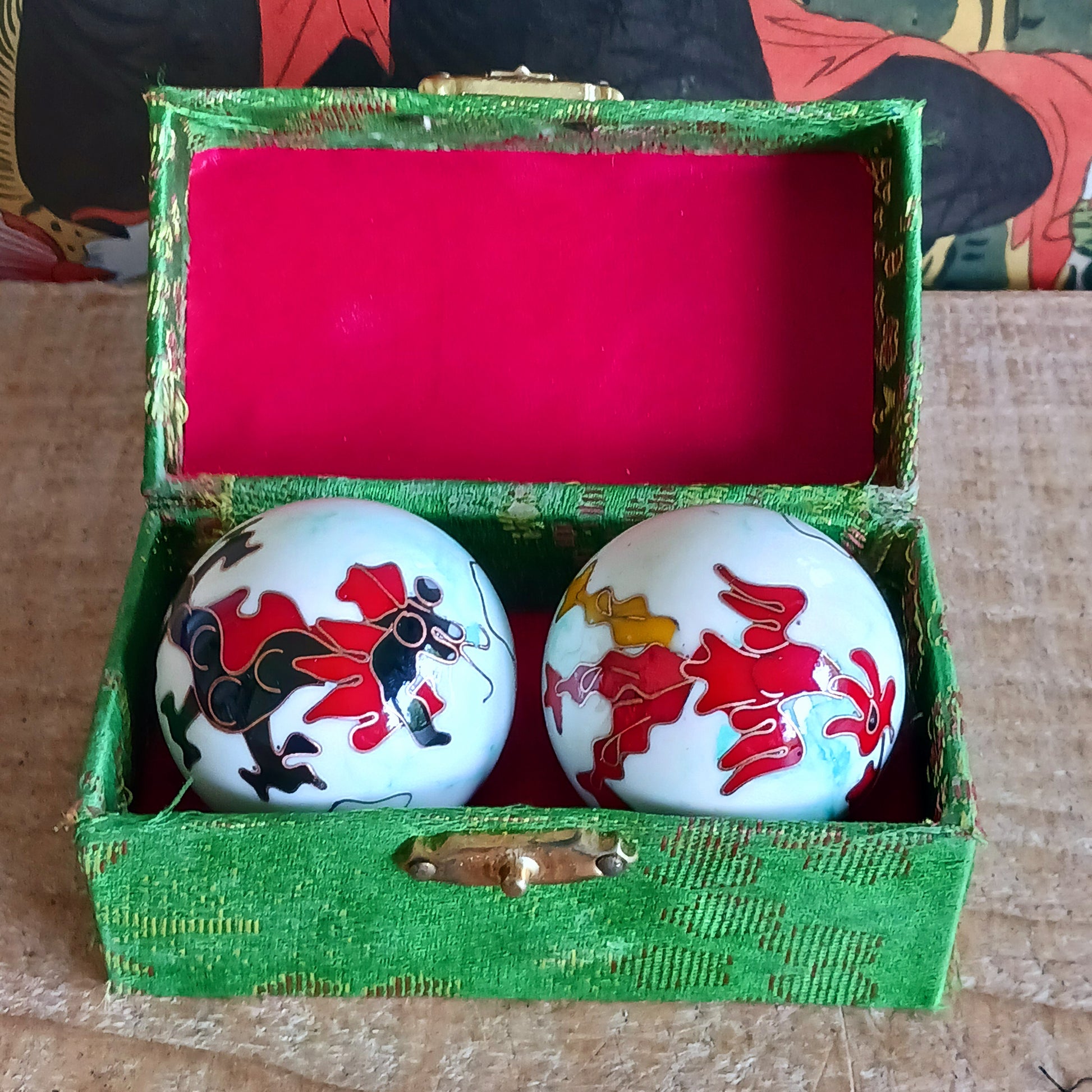 Boost hand flexibility and focus with Chinese Health Balls. Includes 2 chime balls in a silk brocade box. Ideal for relaxation, therapy, and energy balance.