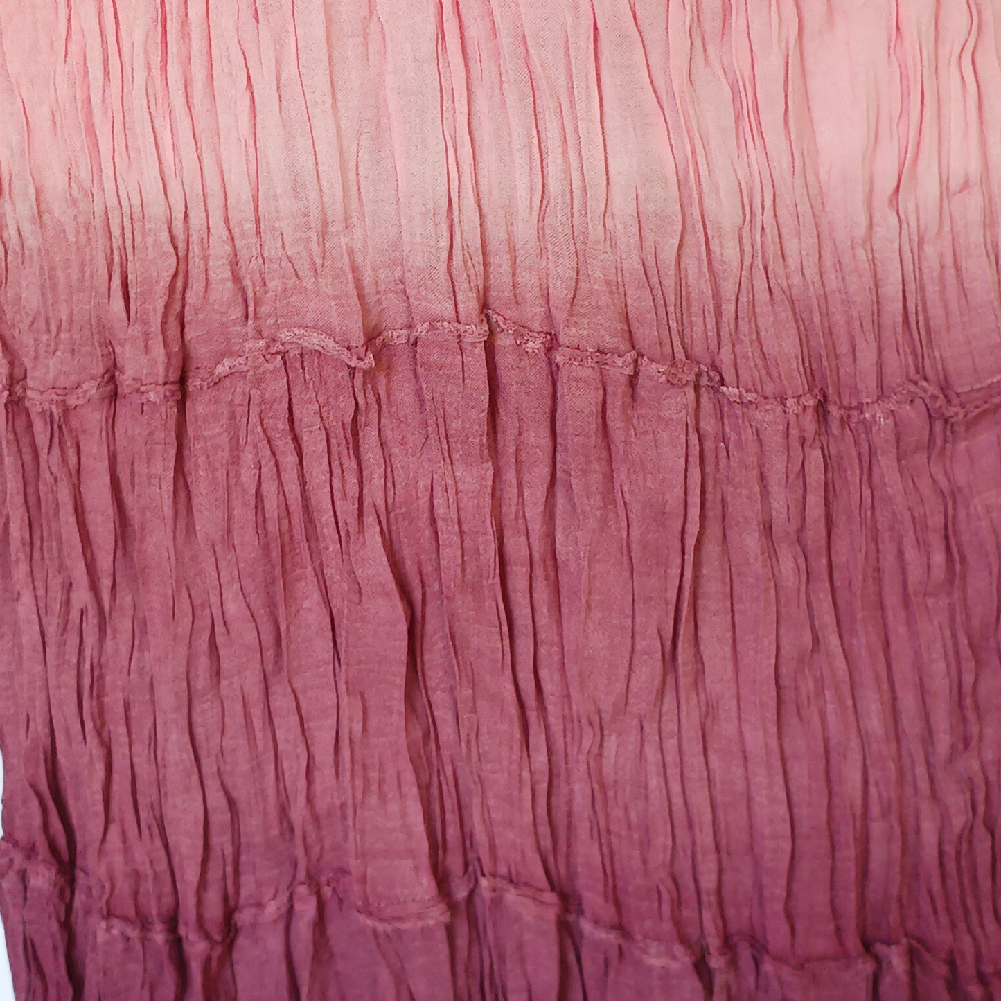 This beautiful Indian crinkle skirt is lovely and light so you can move with ease and comfort on a sunny day or a hot night.  Made from rayon crepe, you can’t go wrong with this lovely skirt, it will add to your flowing summer style. And as rayon is quick drying, it also makes this a great beach cover up skirt.