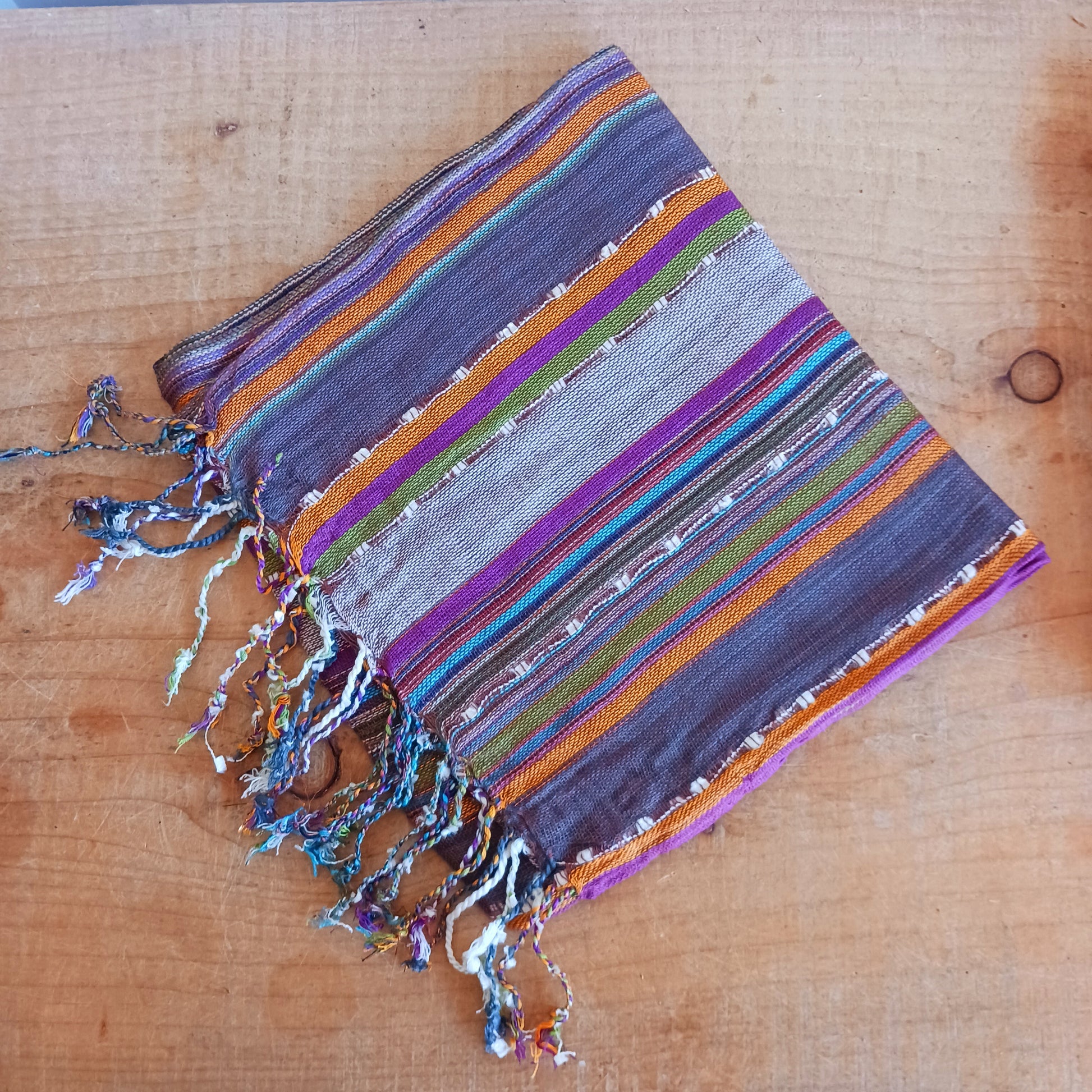 Immerse yourself in the alluring world of bohemian fashion with this delicate Indian Boho Scarf. Crafted with care, each scarf captures the essence of India's free-spirited charm, adding a touch of Boho elegance to your outfit. 