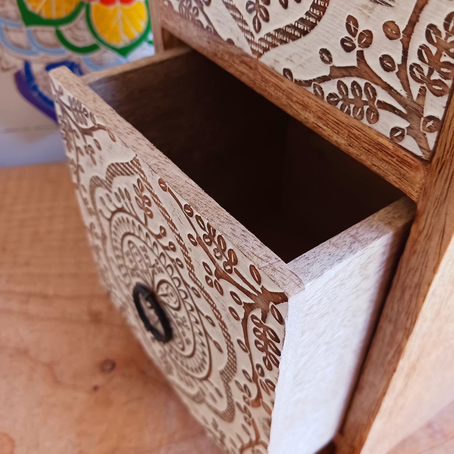 Bring balance and beauty to your space with this handcrafted mango wood drawer cabinet, featuring an intricate mandala design on the front panels. Perfect for organising your wellness accessories, stationery, jewellery, or essential oil droppers, this piece combines practicality with mindful artistry. 