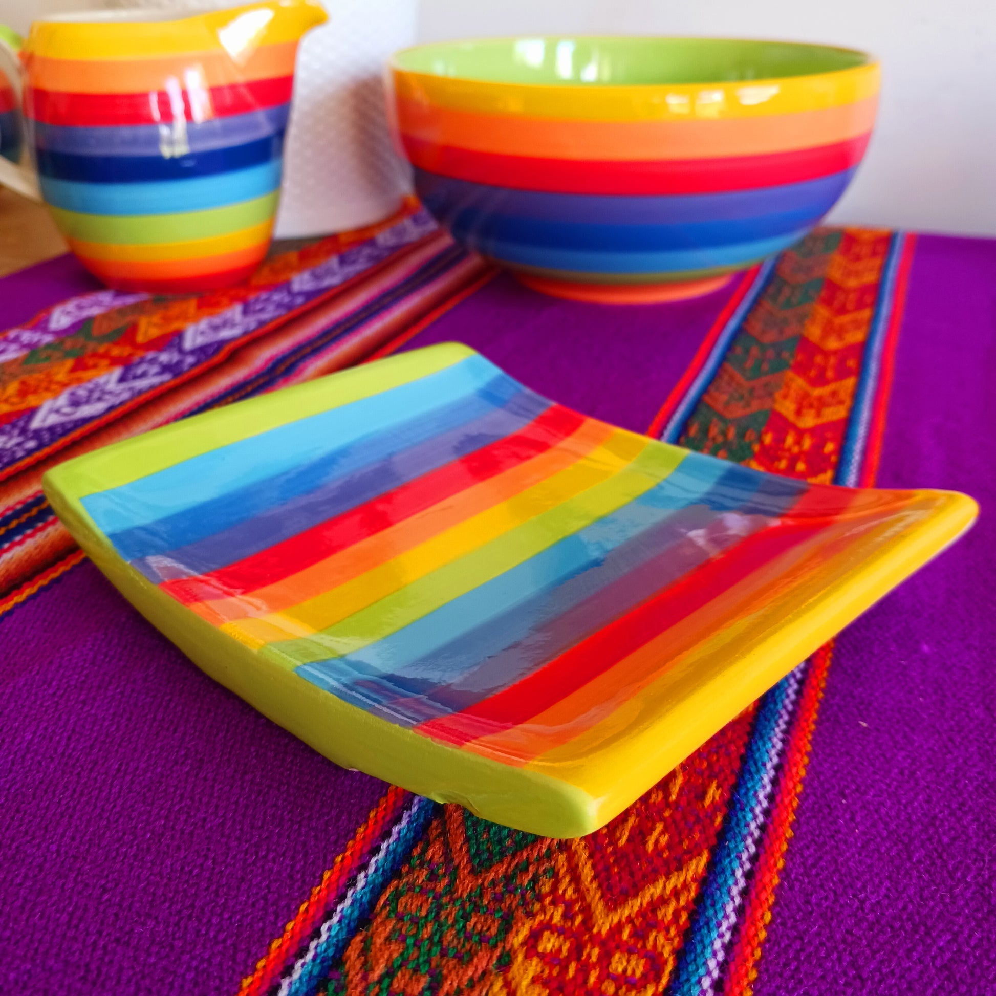 An imaginative decoration for a bathroom, shower or WC, this colourful, rainbow striped ceramic soap dish is easy to locate and creates a cheerful impression.