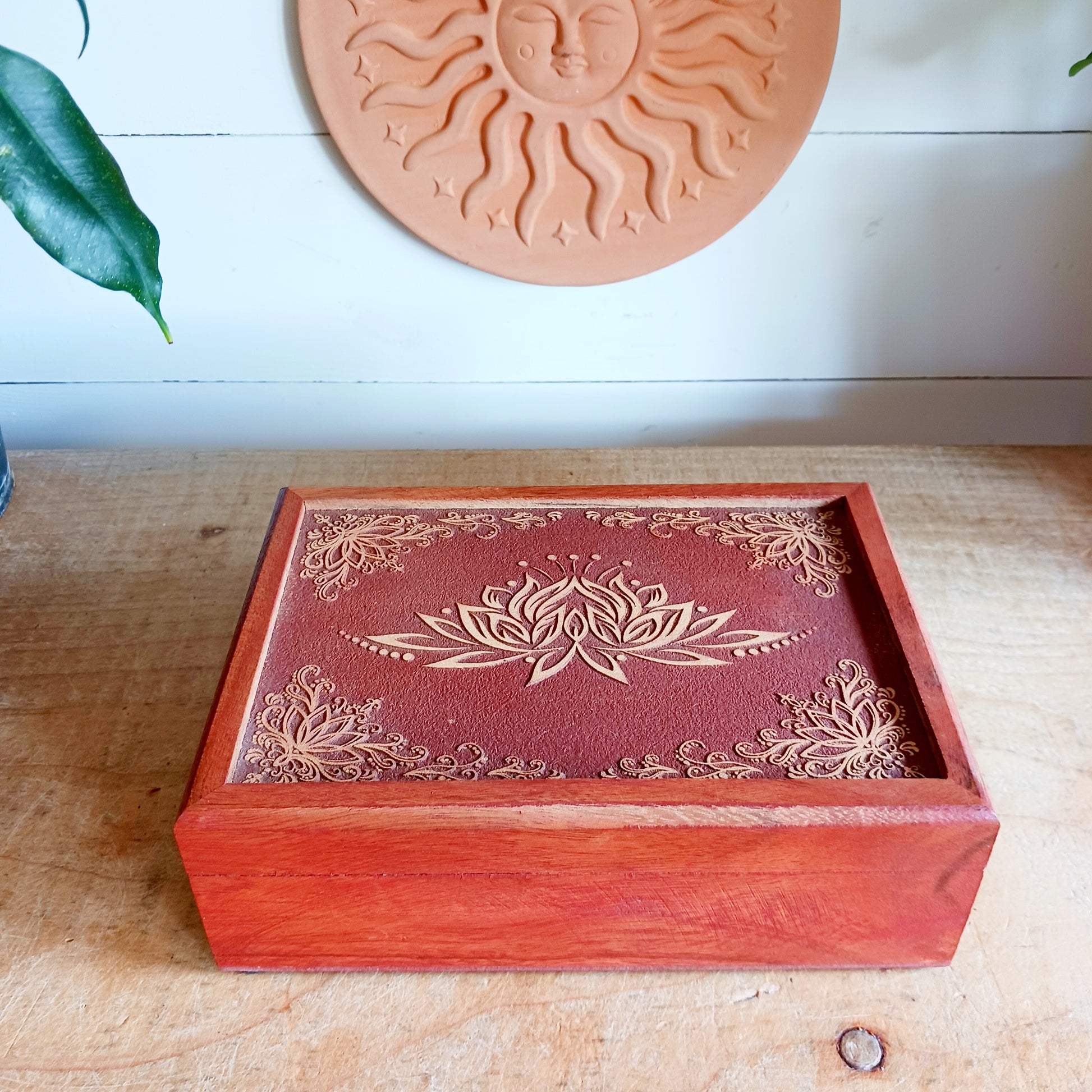 Celebrate the elegance of hand-carved craftsmanship with this Wooden Lotus Keepsake Box, made from sustainably sourced mango wood in India. The intricate Lotus design embodies spiritual harmony, making it perfect for storing jewellery, trinkets, or cherished keepsakes.