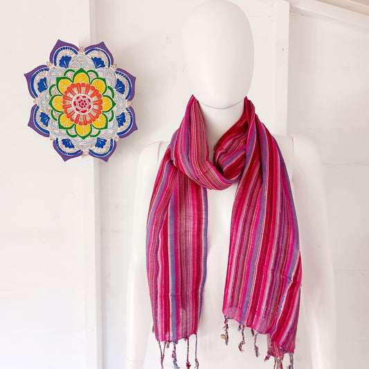 Immerse yourself in the alluring world of bohemian fashion with this delicate Indian Boho Scarf. Crafted with care, each scarf captures the essence of India's free-spirited charm, adding a touch of Boho elegance to your outfit.