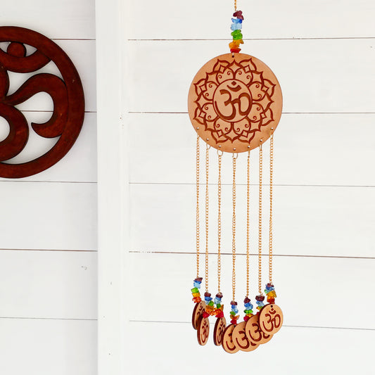 Enhance your space with spiritual harmony and vibrant energy using this beautifully crafted Wooden OHM Chakra Hanging Decoration. Featuring a finely engraved wooden OHM symbol and seven dangling OHM charms, each representing one of the seven chakra colors, this unique piece blends powerful symbolism with elegant design.