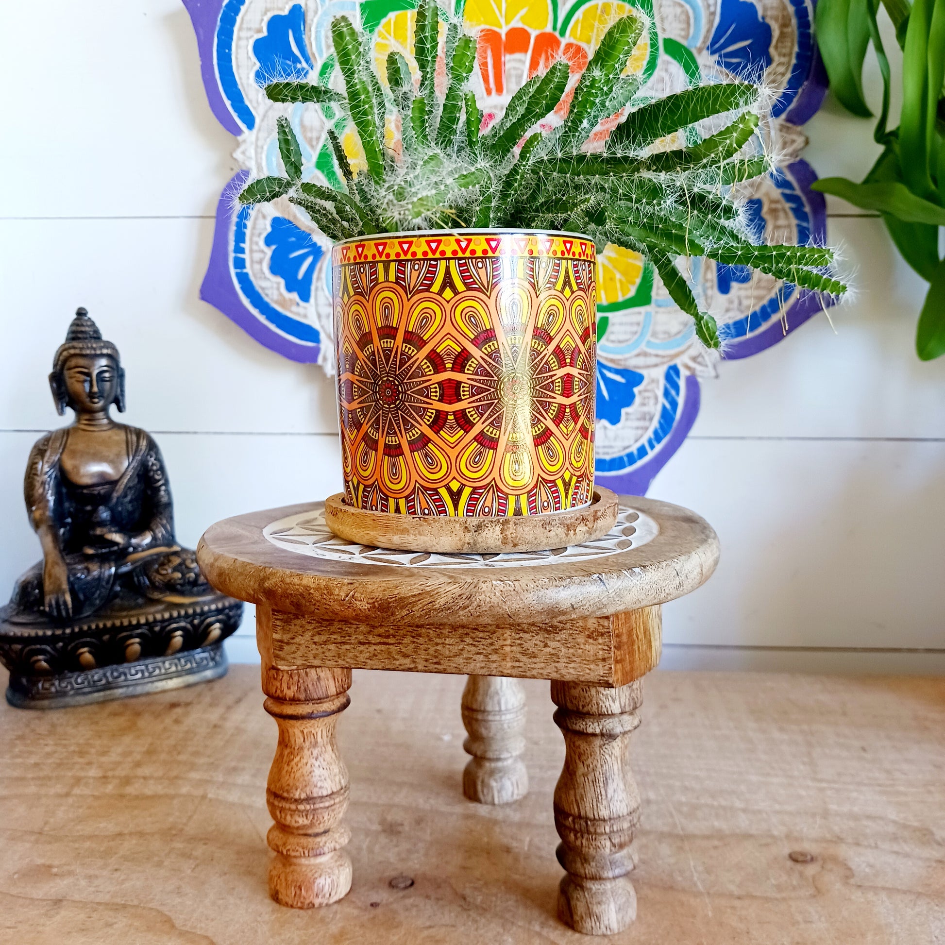 Bring the beauty of sacred geometry into your space with these compact Flower of Life tables. Handcrafted from solid mango wood, each table features a finely engraved Flower of Life symbol on top – an ancient pattern representing the interconnectedness of all life. 