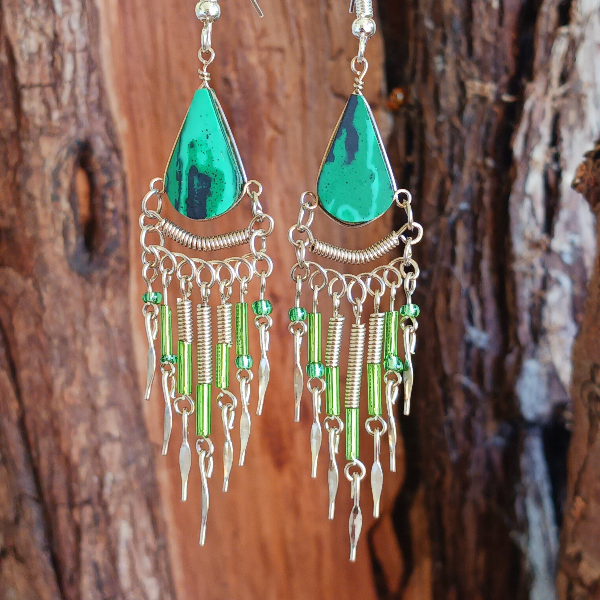 These beautiful hoop earrings incorporate a dark green agate stone with Silver plated hooks. These earrings have been hand made and are presented in a traditionally made pouch, gift wrapped and ready to give☸