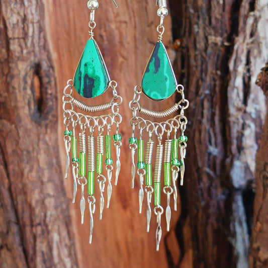 These beautiful hoop earrings incorporate a dark green agate stone with Silver plated hooks. These earrings have been hand made and are presented in a traditionally made pouch, gift wrapped and ready to give☸