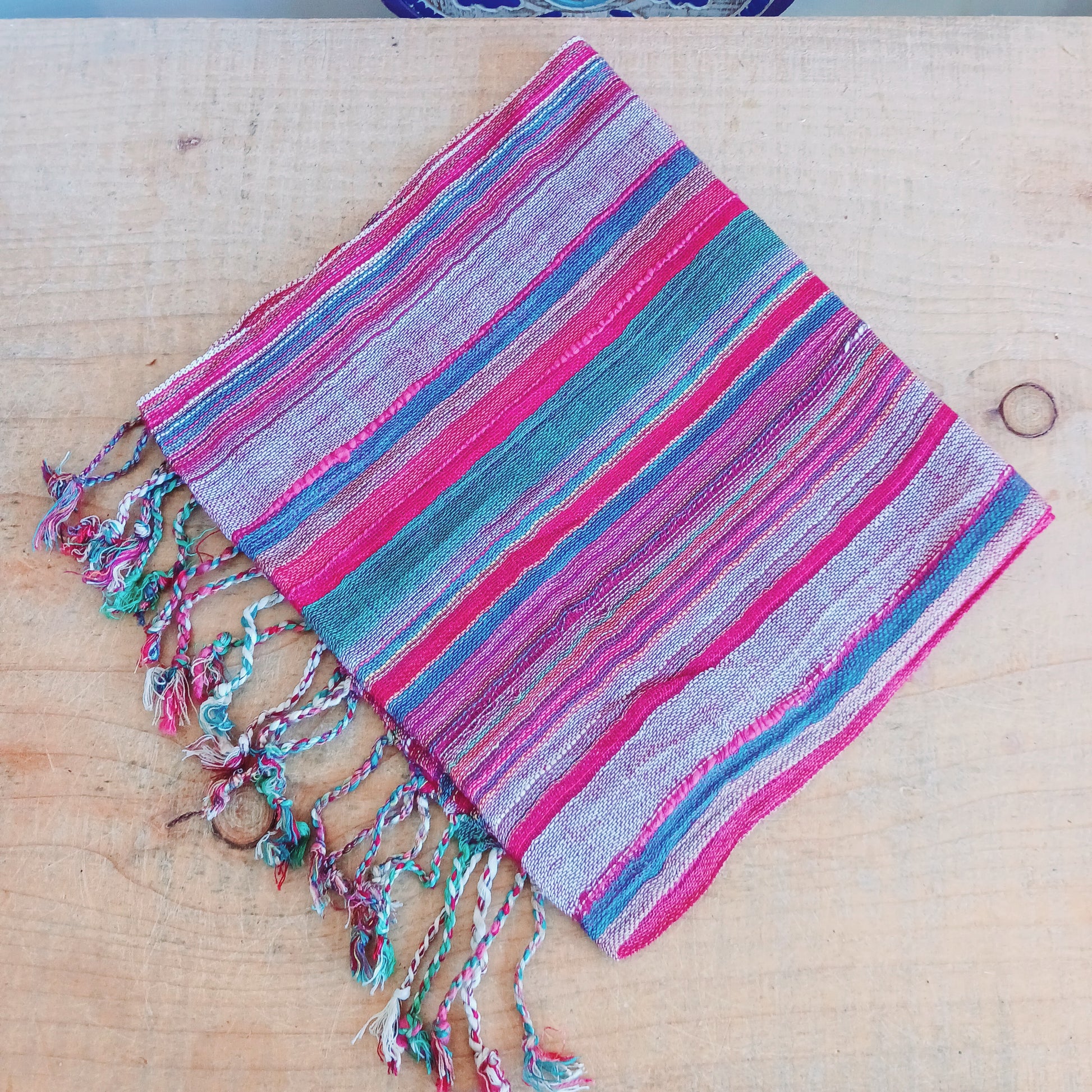 Immerse yourself in the alluring world of bohemian fashion with this delicate Indian Boho Scarf. Crafted with care, each scarf captures the essence of India's free-spirited charm, adding a touch of Boho elegance to your outfit.