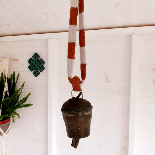 These traditionally designed large size yak bells come with a strong woolen neck strap for hanging. Traditionally these bells are hung around the necks of yaks in Nepal and Tibet so the animals can be located. Nowadays people use them as windchimes as well. The bell produces a wonderfully unique deep and clear sound.