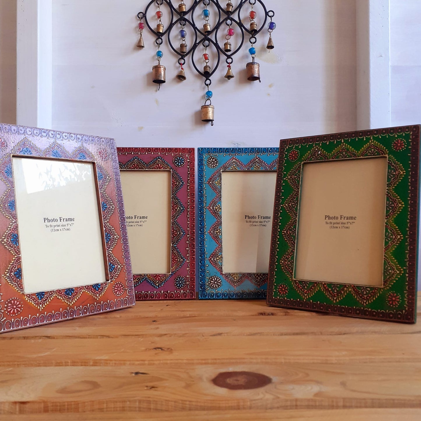 These pretty photo frames have wonderful detail and craftsmanship, intricately hand painted in India on a Fairtrade basis by skilled artisans. This level of skilled painting can only be carried out by the most experienced painters, ensuring that each photo frame is hand painted with the utmost precision and care.